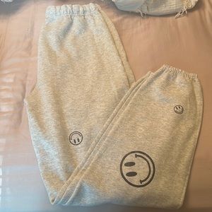 Smiley faced sweatpants